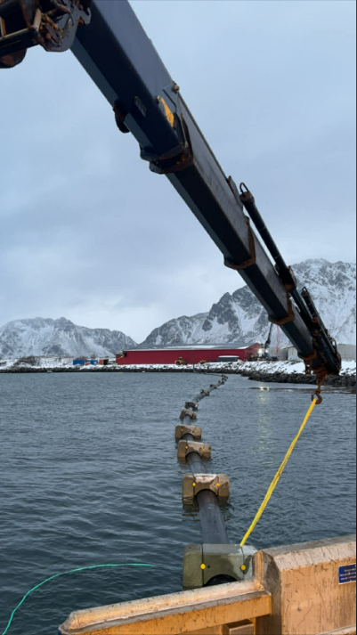 AQ Solutions marine installation — crane work at sea