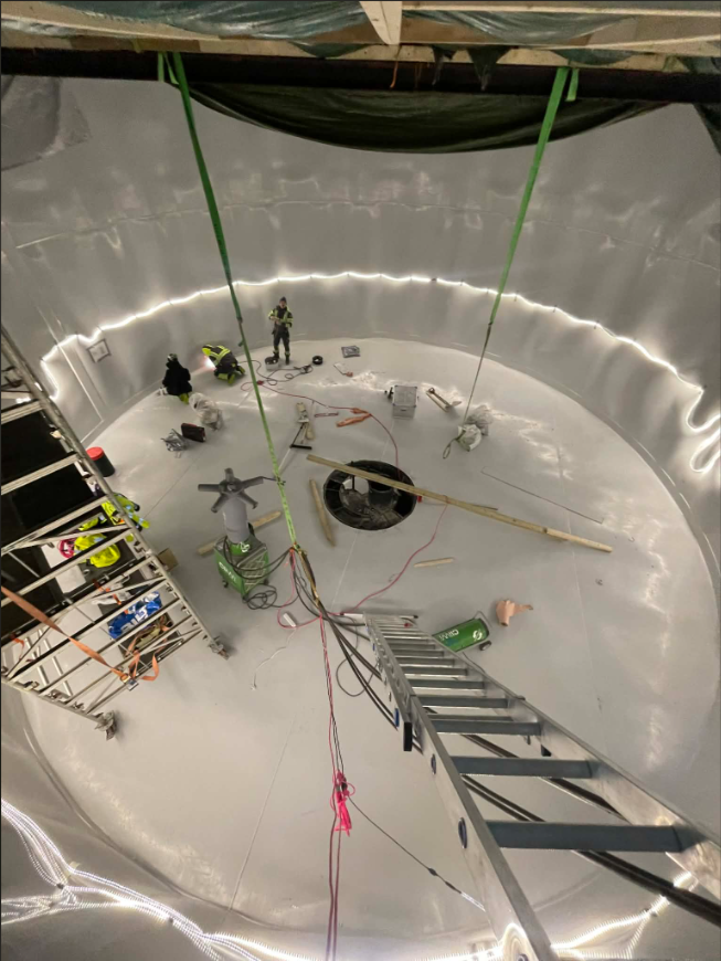 Interior tank installation — AQ Solutions crew at work